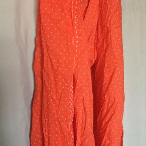 Pop your outfit with a cute scarf.